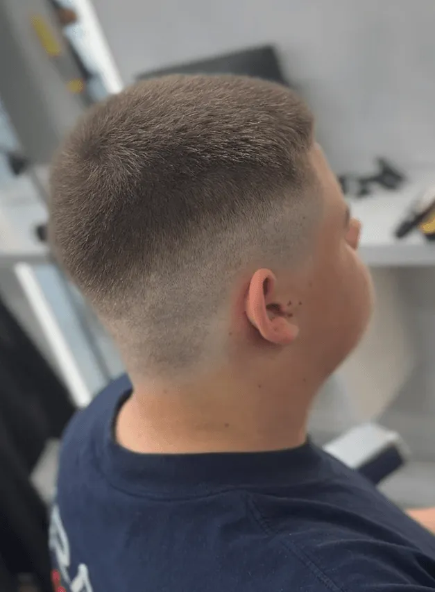 Short textured crop with skin fade, rear view